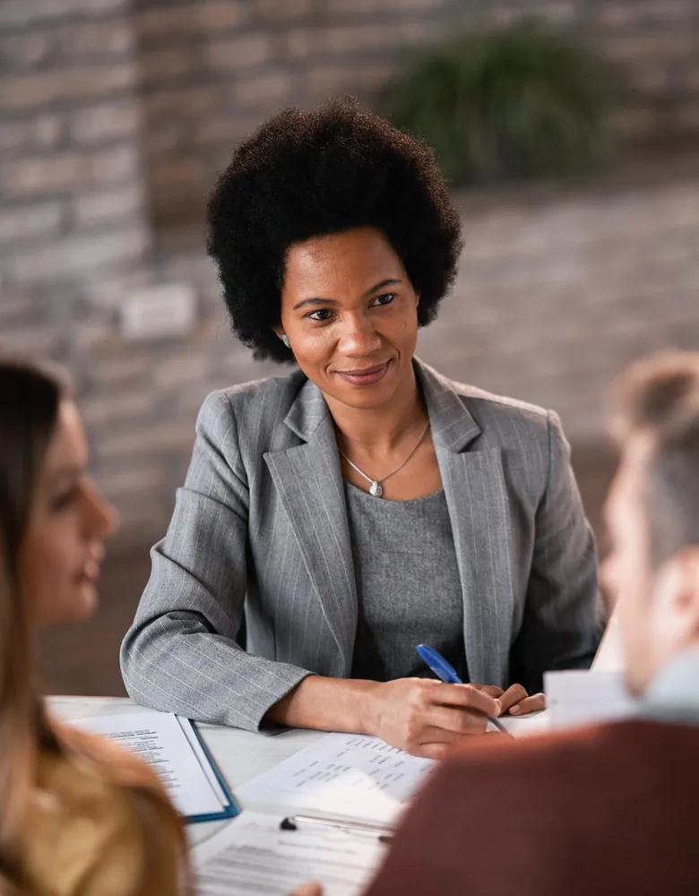 An attorney meeting with a couple